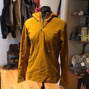 Arc’teryx mustard yellow rain coat